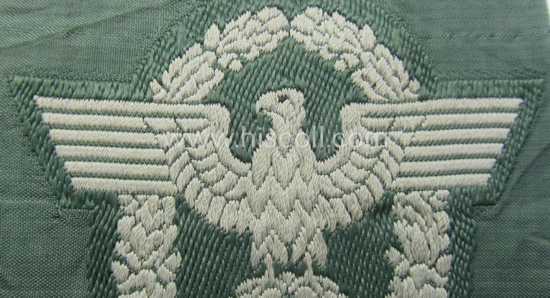 Police- (ie. 'Polizei'-) related armbadge (ie. arm-eagle) being a typical 'BeVo'-woven example