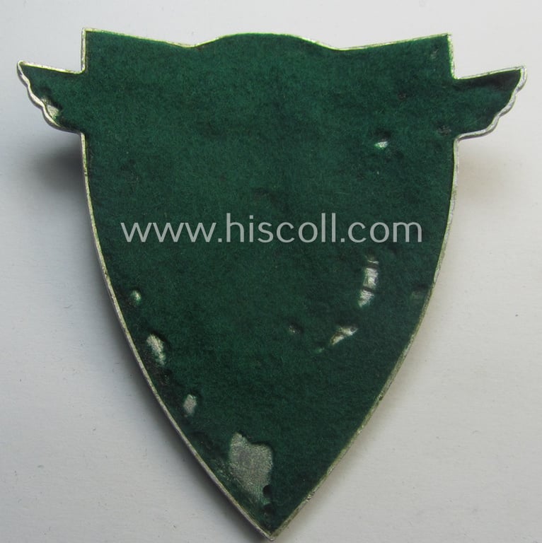 Superb - quite rarely seen and very detailed! - aluminium-based, N.S.K.K.-related armshield (ie. 'Ärmelshield') depicting the typical N.S.K.K.-eagle-device and text that reads: 'Verkehrserziehungsdienst'