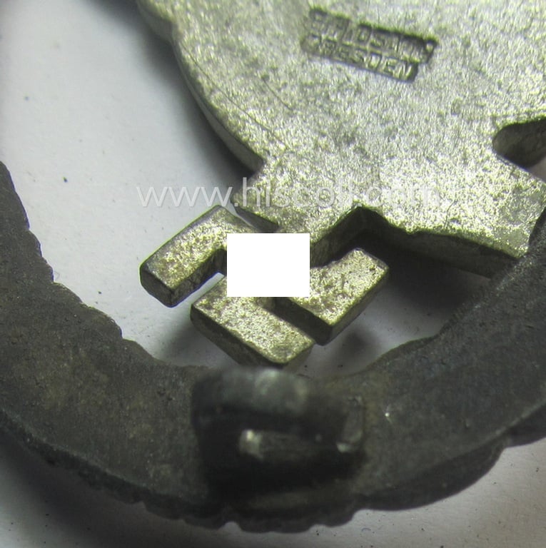 Zinc- (ie. 'Feinzink'-) based version of a WH (Luftwaffe) 'Fallschirmschützen-Abzeichen' (being a maker-marked, 'Type D'-pattern example as was produced by the 'G.H. Osang'-company)