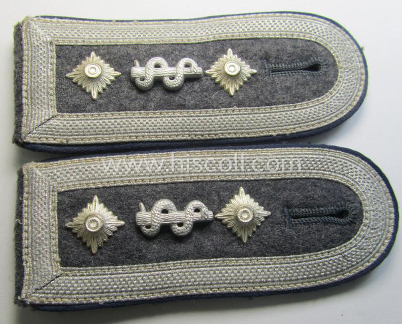 Superb - and/or fully matching! - neatly 'cyphered' pair of WH (Luftwaffe) NCO-type shoulderstraps as piped in the darker-blue-coloured branchcolour as was intended for an: 'Oberfeldwebel der Sanitäts-Truppen'