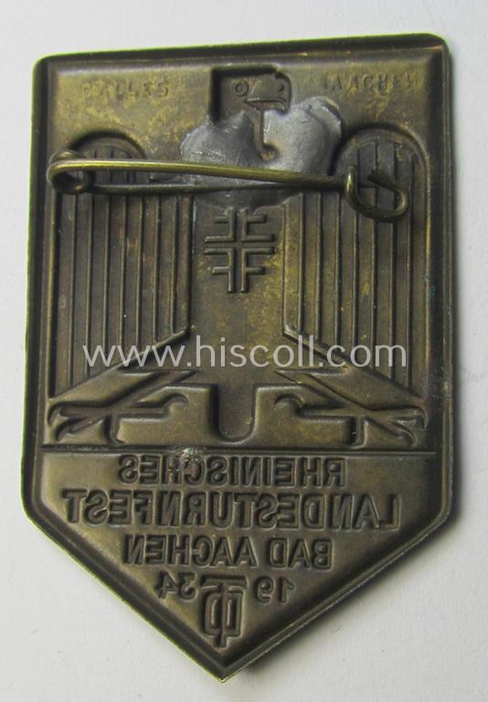 Unusual, 'Deutscher Turnerbund'-related 'tinnie' being a maker- (ie. 'Calles - Aachen'-) marked example depicting a stylished eagle-device, TD-logo and text: 'Rheinisches Landesturnfest - Bad Aachen - 1934'