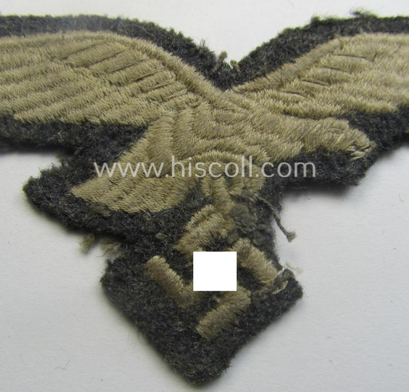 WH (Luftwaffe) EM- (ie. eventually NCO-) type breasteagle (being a once tunic-attached example as executed in typical machine-embroidered-pattern)