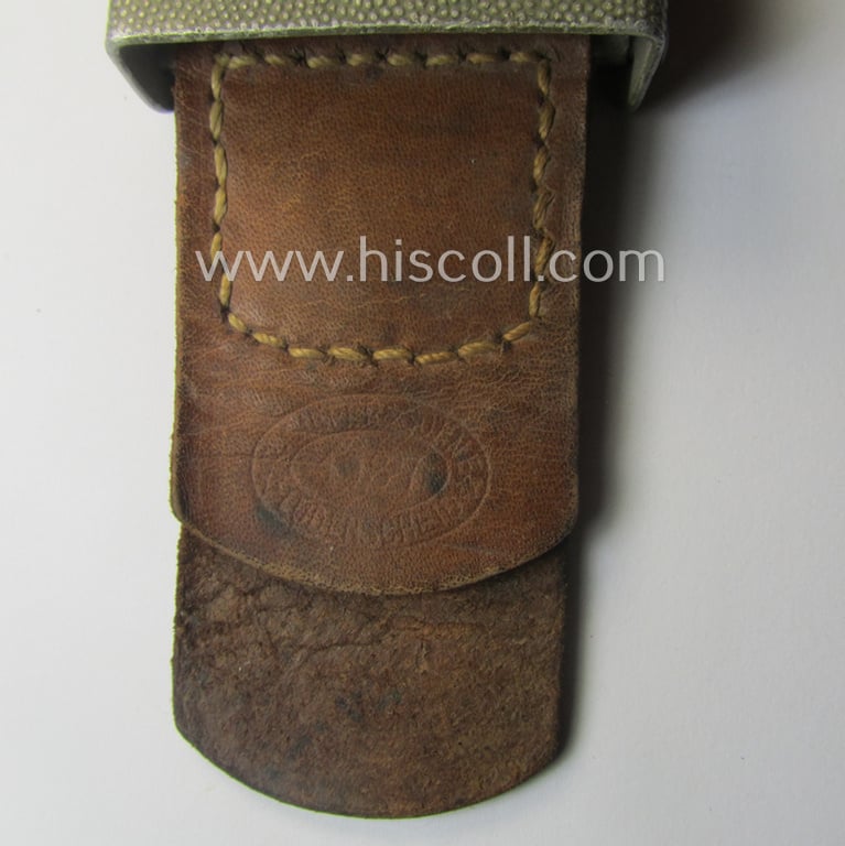 WH (Heeres) 'standard-pattern', field-grey-toned- and aluminium-based belt-buckle being a maker- (ie. 'R. Sieper & Söhne'-) marked- and/or: '1937'-dated example that comes mounted onto its leather-based tab