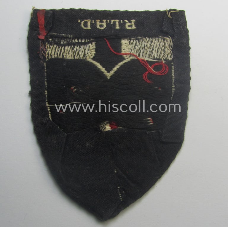 Truly used, EM- (ie. NCO-) pattern, so-called: RAD (ie. 'Reichsarbeitsdienst') sleeve-badge (or: 'Dienststellenabzeichen') bearing the specialist- ie. unit designation: '206/8' and that came with 3 photographs of its bearer