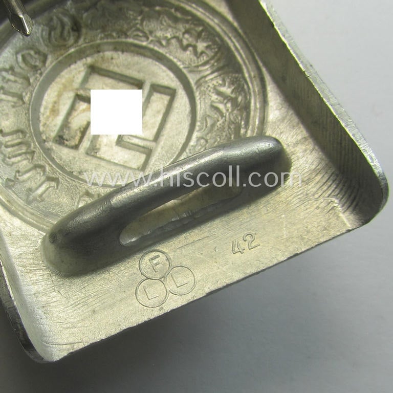 Police (ie. 'Polizei') aluminium-based belt-buckle (ie. 'Koppelschloss für Mannschaften u. Uffz. der Polizei') being a maker- (ie. 'F.L.L.'-) marked and/or: '1942'-dated example that comes in a fully untouched, condition