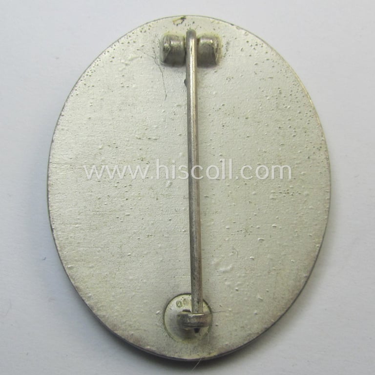 Hardly used- (ie. still 'virtually mint'!) example of a: 'Verwundeten-Abzeichen in Silber' (or: silver-class wound-badge) being a neatly maker- (ie. '100'-) marked example by the: 'Rudolf Wächter u. Lange'-company