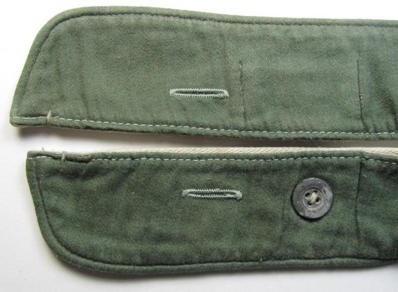 Neat, WH (Heeres, Waffen-SS etc.) greenish- ie. field-grey-coloured- and/or 'standard-issue'-pattern so-called: 'Kragenbinde' (or: uniform inner-collar) being a regular-issued and/or non-maker-marked example that comes in an overall nice conditio...
