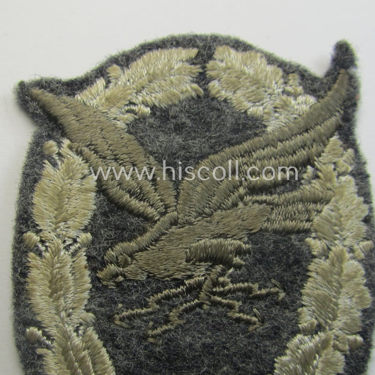 Truly used, WH (Luftwaffe): 'Fliegerschützen-Abz. mit Blitzbündel in Stoff' (or: cloth air-gunners-badge with lightning-bolts) being a nicely executed and typical machine-embroidered specimen