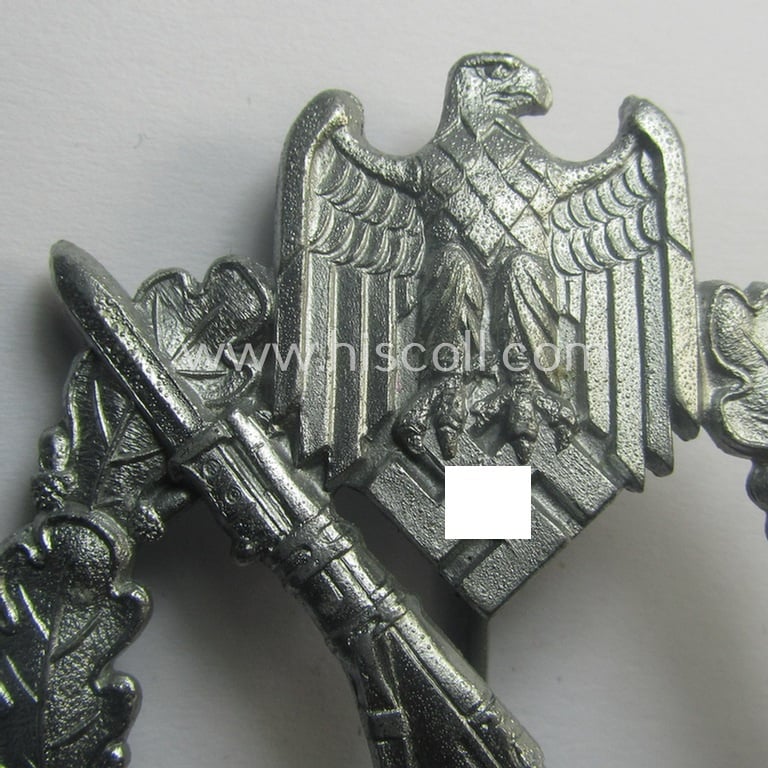 Superb, 'Infanterie Sturmabzeichen in Silber' being a non-maker-marked and/or typical zinc- (ie. 'Feinzink'-) based version (ie. 'crimped scooped rifle-variant') as was (I deem) procuded by the: 'S&L'- (ie. 'Steinhauer u. Lück'-) company