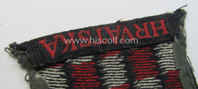 Truly used- and/or worn, multi-coloured- and/or 'BeVo'-woven armshield (ie. 'Ärmelschild') entitled: 'Hrvatska' as was intended for usage by a volunteer who served within the 'Deutsche Wehrmacht' ie. within the 'Kroatische Legion'