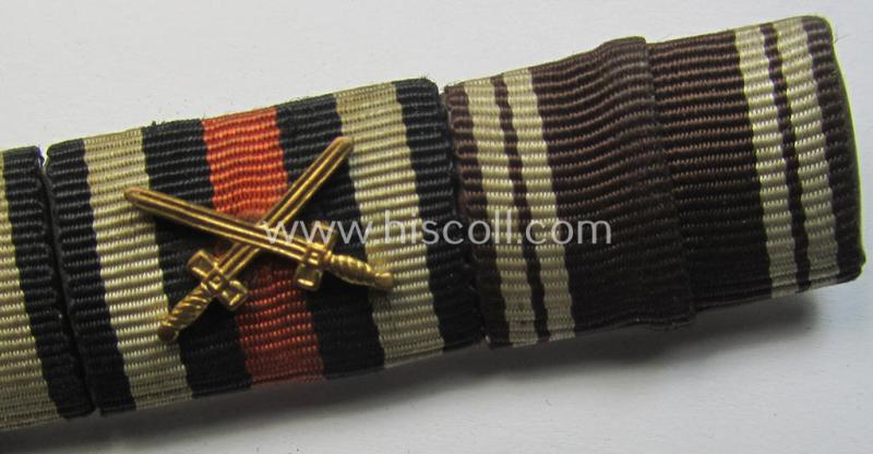 Three-pieced, WH (Heeres etc.) medal-bar (ie. 'Feld- o. Bandspange') showing resp. the ribbons for a WWI-period: 'EK II.Kl.' (or: iron cross second class), a: 'FKK 1914-18 mit Schw.' and a: 'N.S.D.A.P. DA 3. Stufe in Bronze'