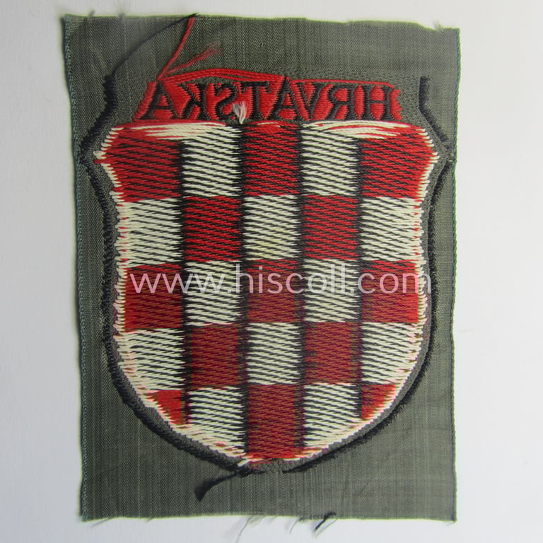 Multi-coloured- and/or 'BeVo'-woven armshield (ie. 'Ärmelschild') entitled: 'Hrvatska' as was intended for usage by a volunteer who served within the 'Deutsche Wehrmacht' ie. within the 'Kroatische Legion'
