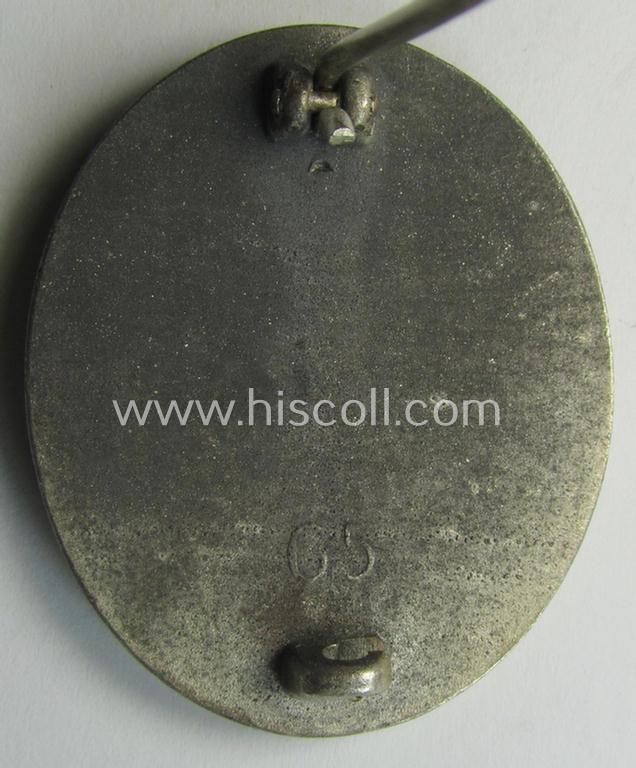 Attractive - and moderately used- and worn! - example of a maker- (ie. '65'-) marked example of a silver-class wound-badge (or: 'Verwundeten-Abzeichen in Silber') as was produced by the 'Hersteller' ie. maker: 'Klein u. Quenzer'