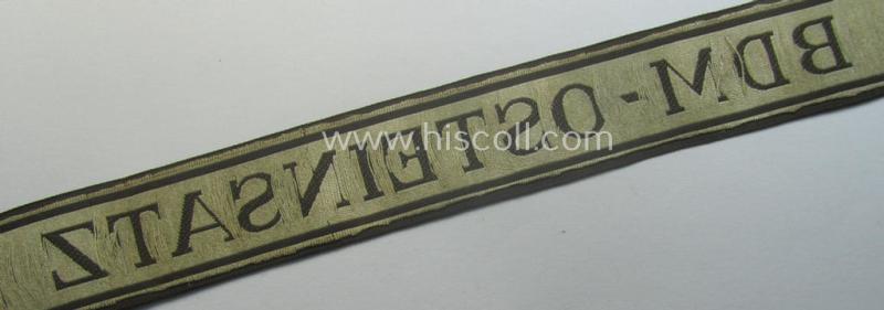 Superb - and actually rarely encountered! - example of the HJ/BDM- ('Hitlerjugend' ie. 'Bund Deutscher Mädel'-) cuff-title (ie. 'Ärmelstreifen') entitled: 'BDM-Osteinsatz' being an example as executed in the neat 'BeVo'-weave pattern