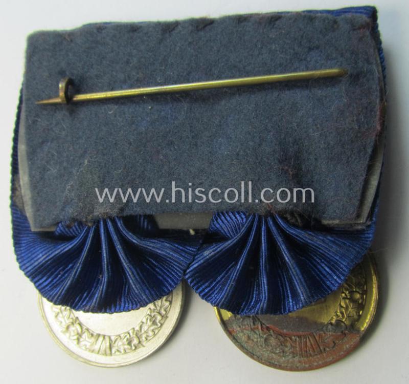Superb, two-pieced medal-bar (ie. 'Spange') showing two: WH (Luftwaffe) so-called: 'Dienstauszeichnungen für 4 u. 12 Jahre Treue Dienste' that both come period-mounted as a so-called: 'Doppelspange'