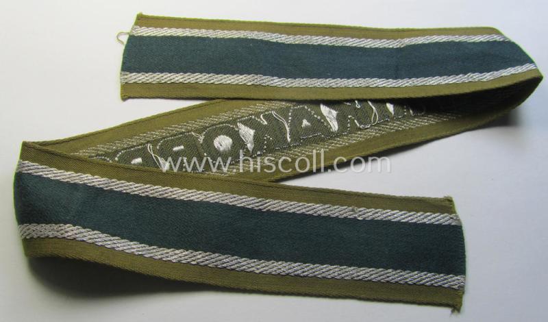 Superb, 'BeVo'-like cuff-title (ie. 'Ärmelstreifen') entitled: 'Afrikakorps' being a presumably issued but never worn example that comes in an overall very nice- (ie. non-shortened- and never tunic-attached-), condition