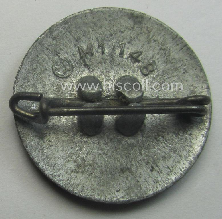 'Painted- (ie. sprayed'-) pattern 'N.S.D.A.P. - Parteiabzeichen' showing the (rarely seen!) makers'-designation: 'RzM' and/or: 'M1/148'