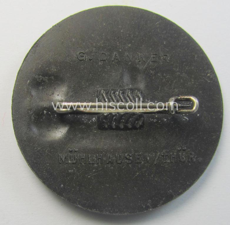 Commemorative, 'N.S.D.A.P.'-related 'tinnie' being a maker- (ie. 'G. Danner - Mühlhausen/Thür.'-) marked example depicting two N.S.D.A.P.-members coupled with the text: 'Thüringen - Kreistag N.S.D.A.P. - 25.26.6.1938'