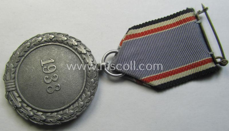 Neat, 'Luftschutz-Ehrenzeichen 2. Stufe' being a non-maker-marked example as executed in (light-weight) aluminium-based metal and that comes mounted onto its period (confectioned) ribbon ie. 'Bandabschnitt'