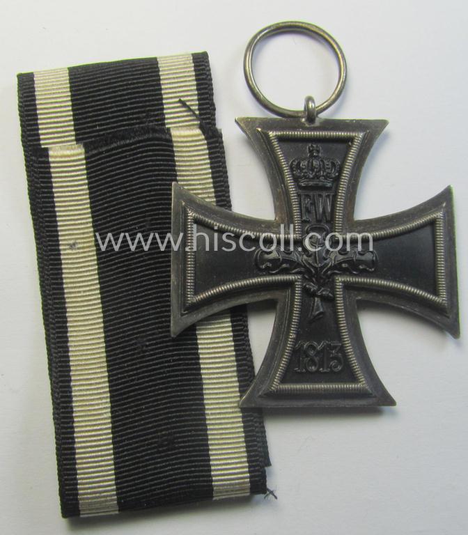 Attractive, WWI-period: 'Eisernes Kreuz II. Klasse' (or: iron cross second class) being a typical maker-marked example that comes together with its (minimally) confectioned but long-sized piece of ribbon (ie. 'Bandabschnitt')