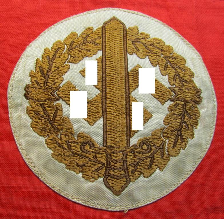 Attractive, linnen-based armband (ie. 'Armbinde') as was intended for usage by the staff of the: 'SA-Wehrmannschaften' (being a hardly used example that still shows its period-attached so-called: 'RzM'-etiket)