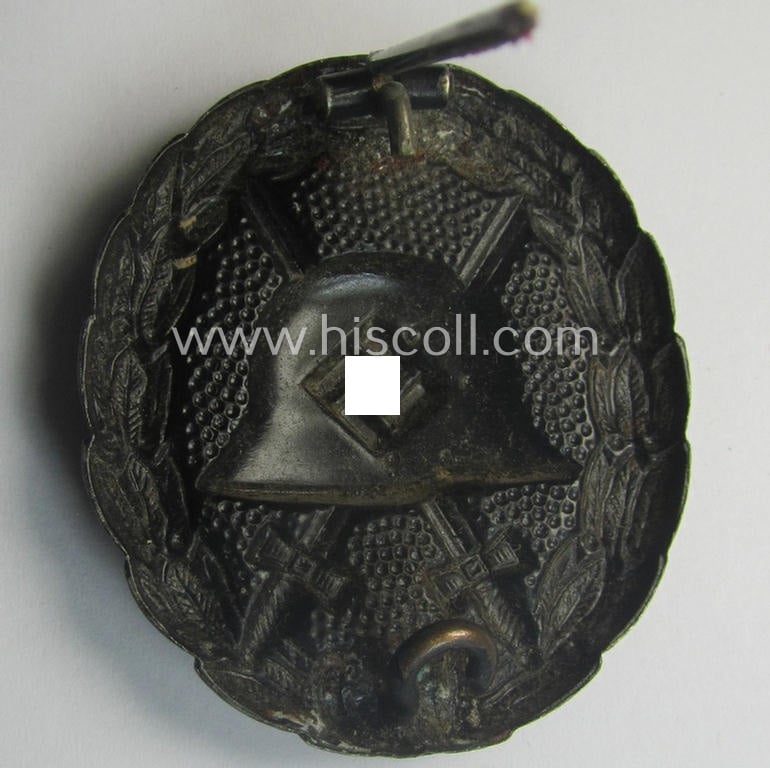 Early-pattern, black-class wound-badge (ie.: 'Verwundeten Abzeichen in Schwarz') being a detailed so-called: 'Spanish Civil-War'-version that comes in a moderately used- and/or worn, condition