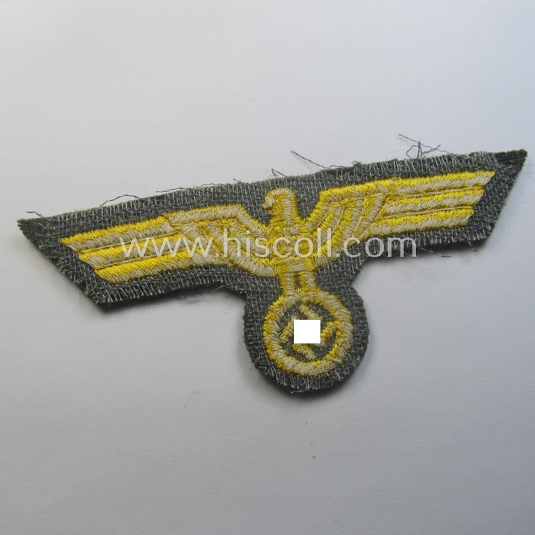 WH (Kriegsmarine) breast-eagle (ie. 'Brustadler für Mannschaften u. Uffz. der Kriegsmarine o. Küstenartillerie') being a 'standard-pattern'- and neatly machine-embroidered example that comes in a never used- ie. still 'virtually mint', condition