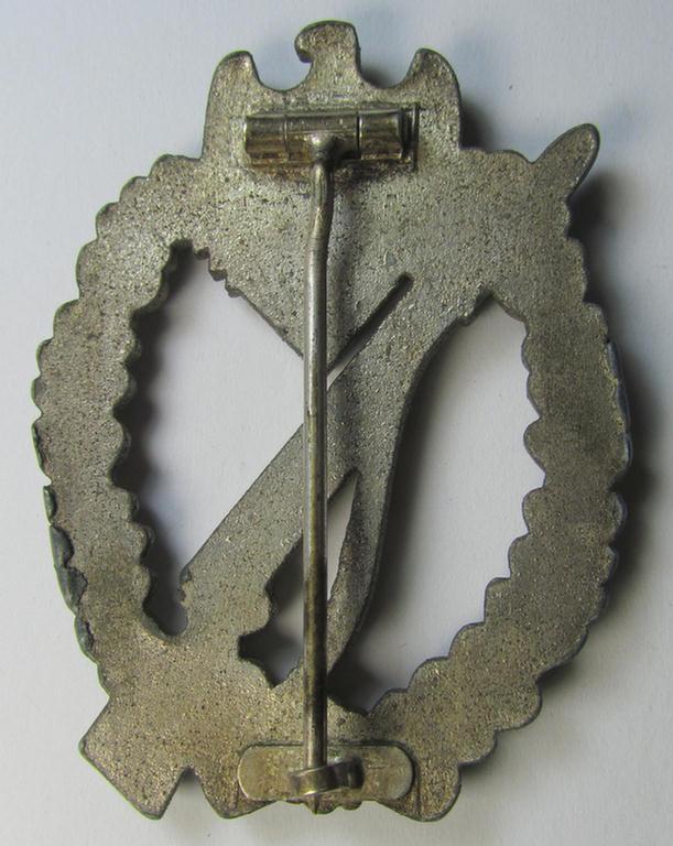 Attractive, 'Infanterie Sturmabz. in Silber' (or: silver-class infantry assault badge ie. IAB) being a detailed albeit unmarked example (of the 'long-barrel-hinge'-variant) as executed in 'Feinzink' as produced by the: 'Steinhauer & Lück'-com...