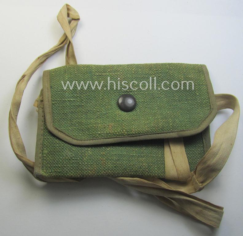 Aluminium-based WH (Luftwaffe) ie. 'Luftnachrichten'-related ID-disc (ie. 'Erkennungsmarke') bearing the stamped unit-designation that reads: 'Ln.Stelle mot - E63' and that comes stored in its period (linnen-based) pouch