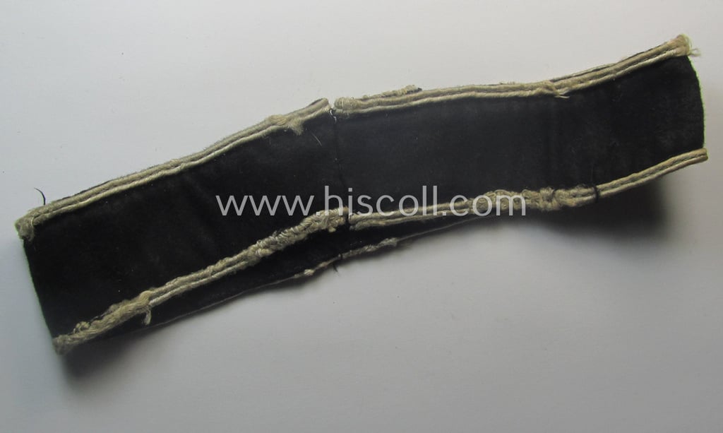 Truly used- and/or worn example of a WH (Heeres) cuff-title ie. armband (ie. 'Ärmelstreifen') entitled: 'Grossdeutschland' (being a neatly machine-embroidered example of the third pattern that was specifically intended for EM- ie. NCO-usage)