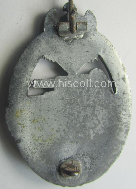 'Panzerkampfabzeichen in Silber' (or: silver-class panzer assault-badge or PAB) being a neat (I deem) somewhat later-war-period zinc- (ie. 'Feinzink'-) version as was procuced by the: 'Frank u. Reif'-company