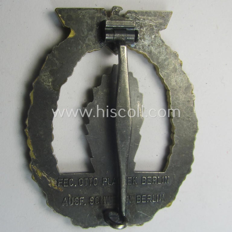 WH (Kriegsmarine) 'Kriegsabzeichen für Minensuch-, U-Boot-Jagd und Sicherungs-Verbände' (being a very detailed and clearly maker-marked example as executed in multi-coloured 'Buntmetall' as produced by the: 'Schwerin - Berlin'-company)
