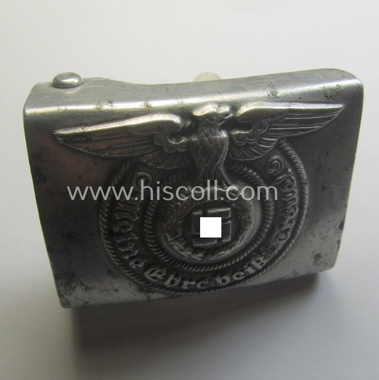 Attractive, SS- (ie. Waffen-SS), aluminium-based enlisted-mens'- (ie. NCO-type-) belt-buckle being a neatly maker- (ie. 'RzM - 822/38 SS'-) marked example that comes in a clearly used- ie. worn, condition