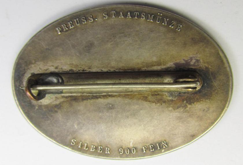 Pre-war-period- and/or genuine silver-based (ie. '900'-stamped), so-called: 'Erinnerungszeichen Verdienste um das Feuerlöschwesen 1934', being a very detailed- and maker- (ie. 'Preuss. Staatsmünze'-) marked, example