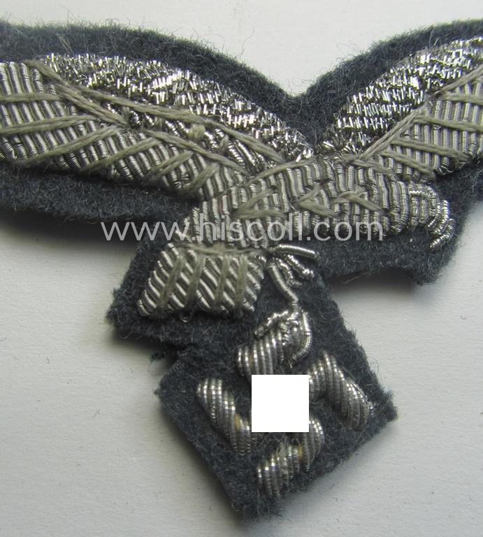 WH (Luftwaffe) officers'-pattern visor-cap-eagle (ie. 'Adler für LW-Offiziers-Schirmmütze') being a neatly hand-embroidered example of the: 'Extra Qualität' that comes in a 'virtually mint ie. unissued'-), condition