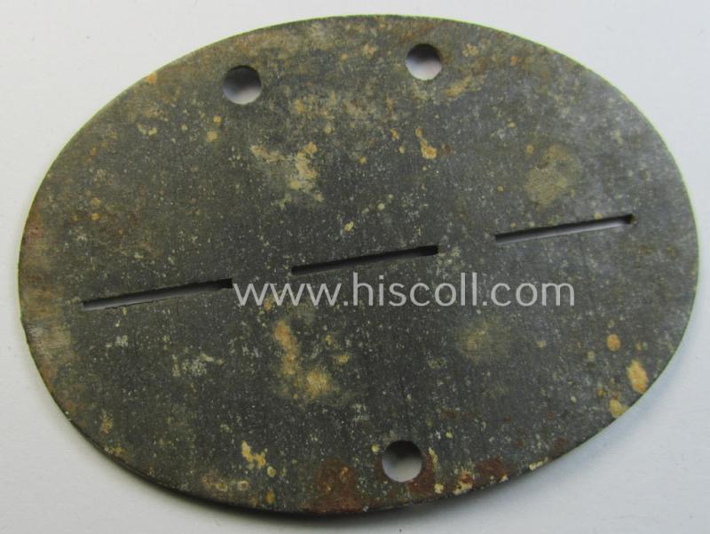 Neat - and unusually found! - typical zinc-based, 'Organisation Todt'-related ID-disc (ie. 'Erkennungsmarke') bearing the clearly stamped designation that reads: 'Org. Todt - 96864'