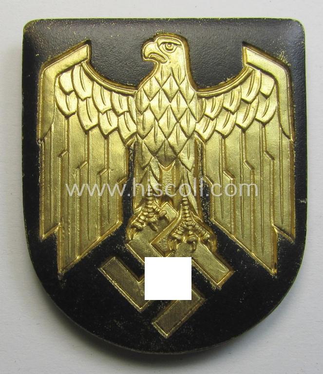 Superb, WH (KM) tropical- (ie. 'DAK'- or: 'Deutsches Afrikakorps'-) related- and/or zinc-based, eagle-'pith-helmet'-shield being a maker- (ie. 'G.B.-41'-) marked example that comes in a very nice- (ie. 'virtually mint- ie. unissued'-), cond...