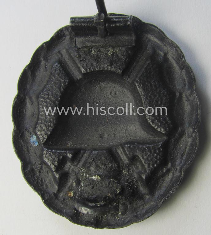 WWI-pattern, black-class wound-badge (ie.: 'Verwundeten Abzeichen in Schwarz') being a very detailed (and magnetic) example that comes in a just minimally used- ie. worn, condition