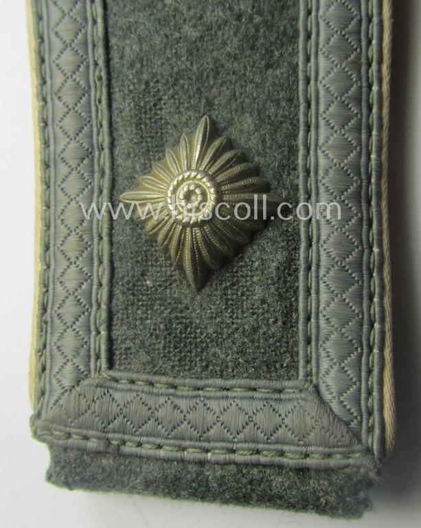 Single, WH (Heeres) NCO-type (ie. 'M40'- ie. 'M43'-pattern) shoulderstrap having the white-coloured branchcolour as was intended for - and clearly worn by! - a: 'Feldwebel der Infanterie-Trpn.'