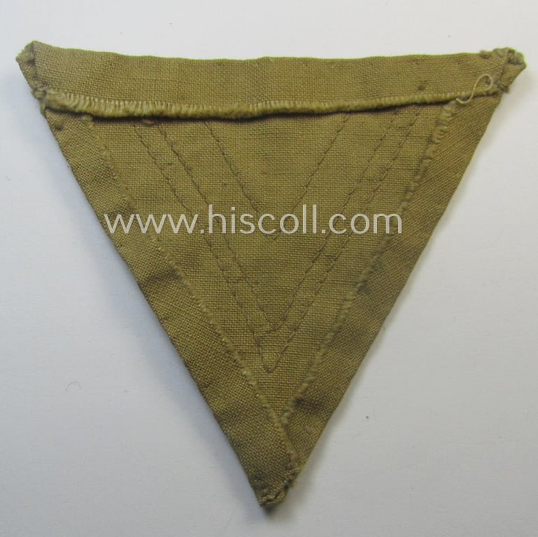 Scarcely found, WH (Luftwaffe) tropical-styled, 'Armwinkel' (or: arm-chevron) as executed on typical beige- ie. tan-coloured linnen as was specifically intended for usage by a soldier with the rank of an: 'Obergefreiter'