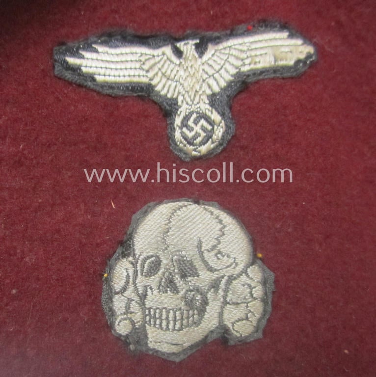 Maroon-red-coloured, Waffen-SS-pattern so-called: 'Fez' having a neat - and fully matching! - silver-grey-coloured- and/or 'BeVo'-woven insignia-set originally- (ie. 'off-factory'-) attached