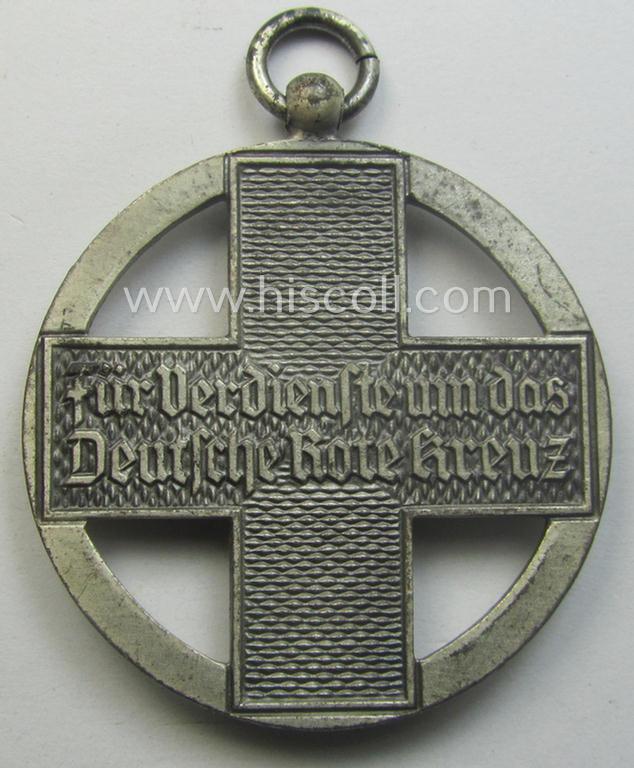 Superb, 'DRK-Ehrenzeichen des 3. Modell' that comes together with its original (regular-sized- and once-mounted) ribbon (ie. 'Bandabschnitt') as issued and/or stored for decades