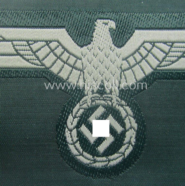 WH (Heeres) early- (ie. pre-war-) period- and/or greyish-coloured breast-eagle of the: 'M36'- (ie. 'M40'-) pattern as was executed in the 'BeVo'-weave pattern on a darker-green-coloured background