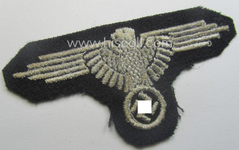 Mid- (ie. later-war-) pattern, 'SS' (ie. 'Waffen-SS') so-called: 'RzM-style' enlisted-mens'-/ie. NCO-pattern arm-eagle as was intended for usage by the various Waffen-SS troops throughout the war