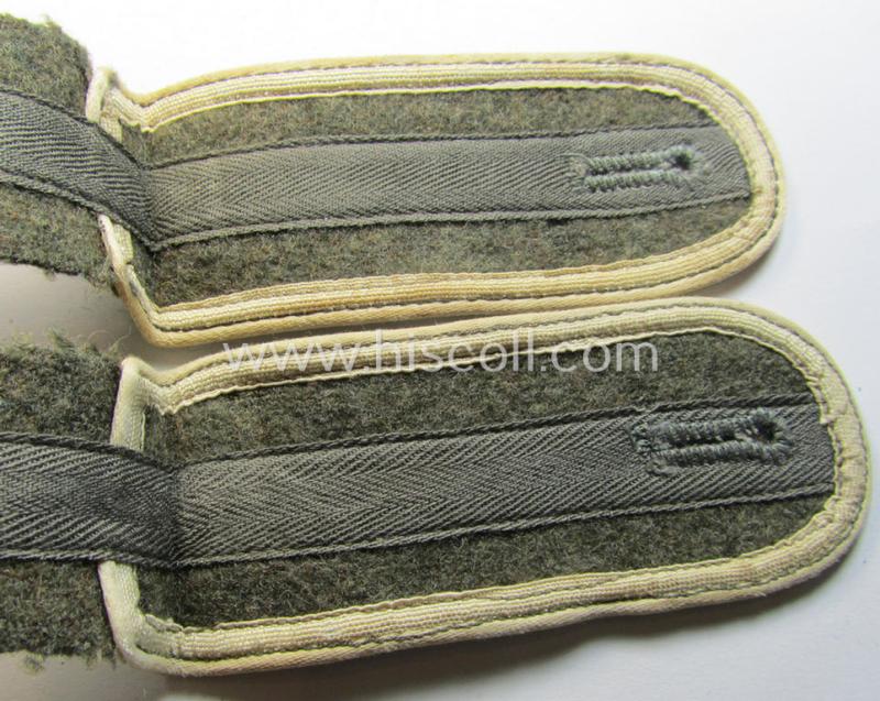 Superb - and fully matching! - pair of later-war-period, so-called: 'M44'-pattern, 'simplified' WH (Heeres) EM-type shoulderstraps as piped in the white-coloured branchcolour as was intended for usage by a: 'Soldat der Infanterie-Truppen'