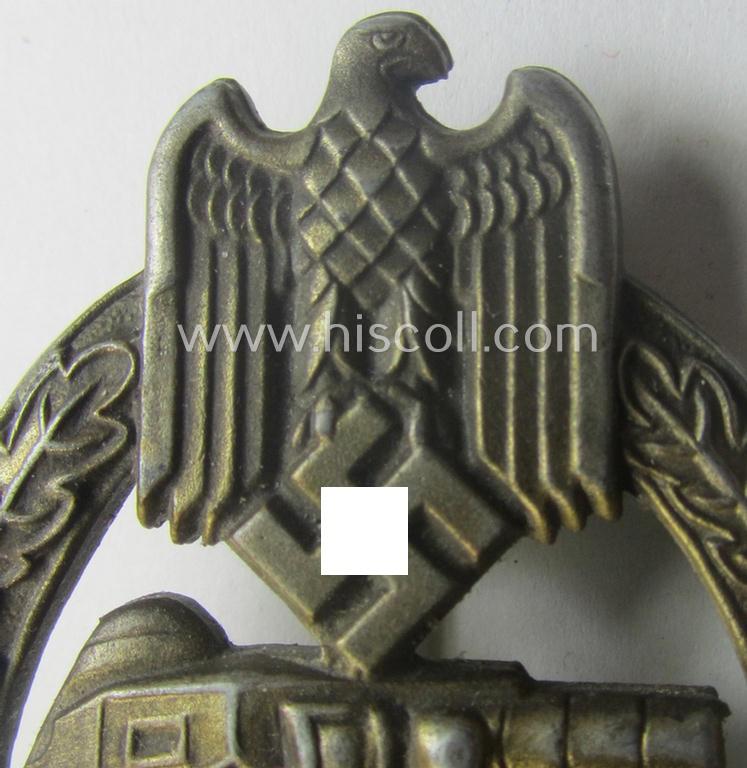 'Panzerkampfabzeichen in Bronze' (or: bronze-class panzer assault badge or PAB) being a neat (I deem) somewhat later-war-period zinc- (ie. 'Feinzink'-) version as was procuced by the: 'Frank u. Reif'-company