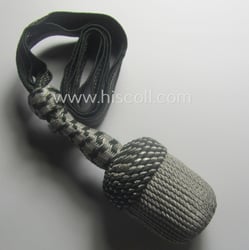 Darker-green- and silver-coloured, NCO-type side-arm knot (ie. 'Portepee'...