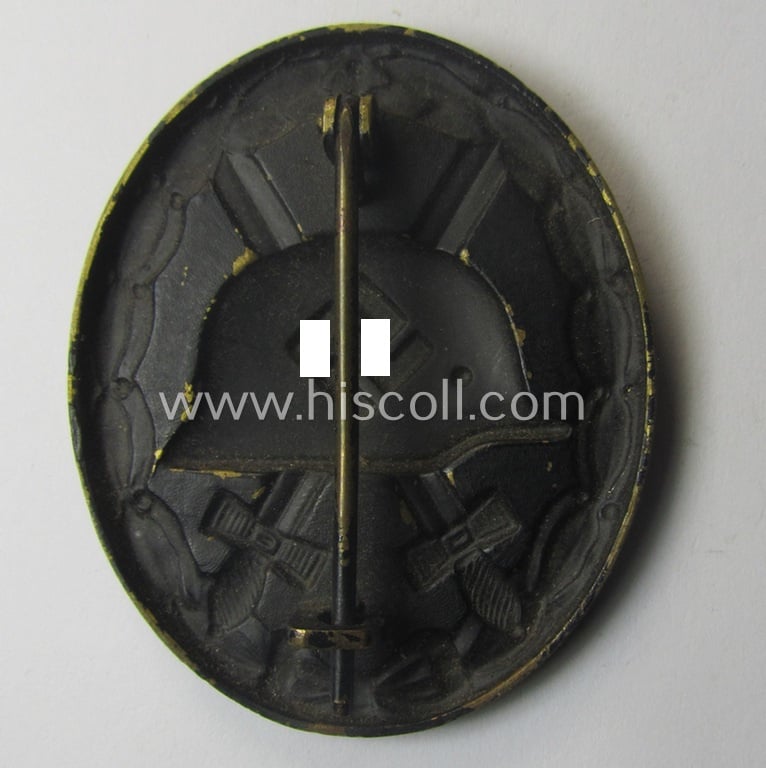 Moderately used- and/or worn, black-class wound-badge (or: 'Verwundeten-Abzeichen in Schwarz') being a typical non-magnetic and/or non-maker-marked example