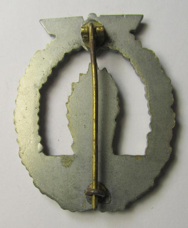 Later-war-period, WH (Kriegsmarine) 'Kriegsabzeichen für Minensuch-, U-Boot-Jagd und Sicherungs-Verbände' being a detailed and non-maker-marked, 'Feinzink'-based example as was produced by the 'S&L'-company