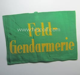 'Deutsche-Wehrmacht'-related, bright-green-coloured and/or linnen-based armband entitled: 'Feldgendarmerie' (as...